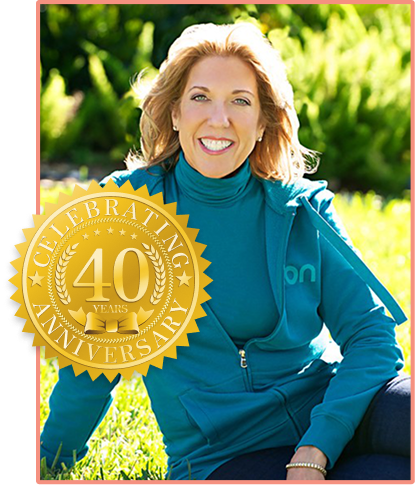 Ellen Rieback, R.N., Director, with the 40 years anniversary badge